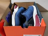 a box with a pair of shoes inside of it