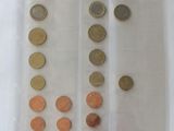 a lot of coins in a plastic bag on the table