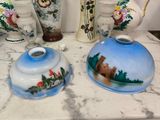 many vases that are sitting on a table