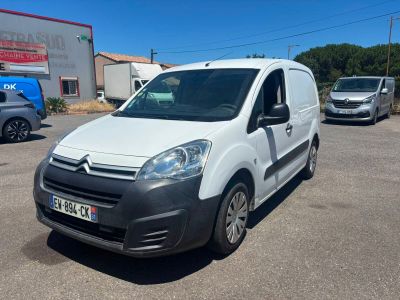 the white van is parked in a parking lot with other cars