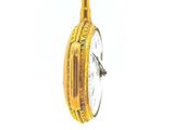 a gold pocket watch hanging from a chain on a white background