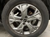 a close up view of a tire on a vehicle
