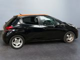 an image of a black car with orange trims