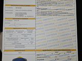 a close up of a document with a picture of a person holding a cell phone