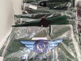 bags of clothing are wrapped in plastic and ready to be shipped