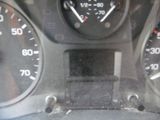 a close up of a car dashboard with gauges and numbers