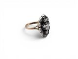 a close up of a ring on a white surface