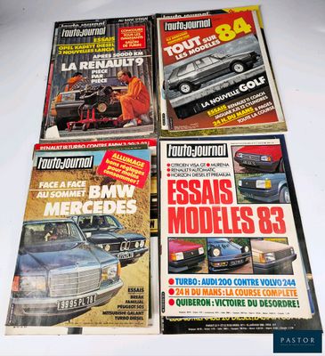 four magazine covers of different cars on a white surface