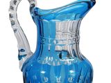 an image of a blue glass pitcher on a white background