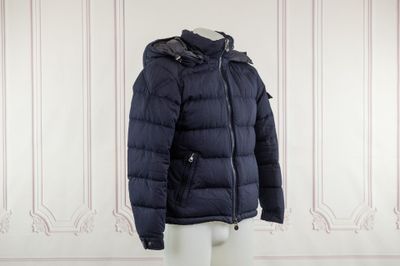 the jacket is blue and has a hood on it