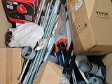 a cardboard box filled with tools and a box of wires