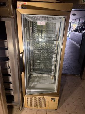 an image of a commercial refrigerator in a store