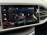 a picture of a car dashboard with a digital display