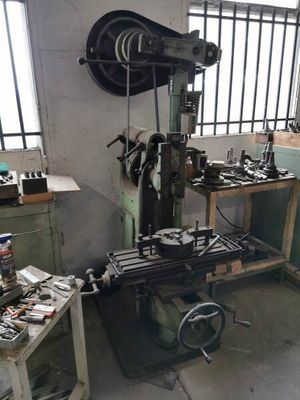 a picture of a machine shop with a lot of tools on it