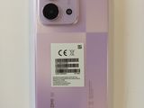 purple iphone 11 pro case with a barcode sticker on the back of it