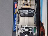 a toy car that is in a box on a table