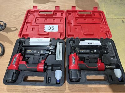 two tools that are sitting on a table