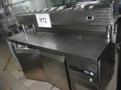 a stainless steel counter top with a number on it