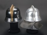 two helmets that are sitting on top of each other