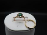 an image of a couple of rings sitting on top of a table