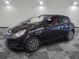 a picture of a black car parked in a garage