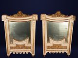paire de miroirs anciens de style Louis XV, en bois sculpté et doré
