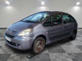 an image of a small car parked in a garage