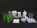 a lot of glass items that are on a table