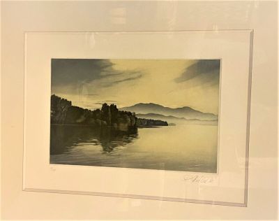 a picture of a picture of a lake with a mountain in the background