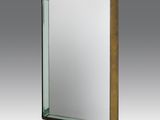 an image of a mirror with a wooden frame on a gray background
