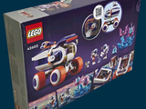 a box of legos with a space ship inside of it