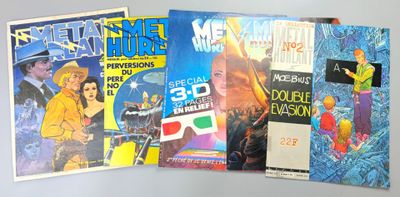 several comics are stacked on top of each other on a table