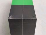 a black box with a green strip on top of it