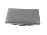a black briefcase sitting on top of a white table