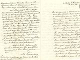 lettre manuscrite écrite à l'encre noire sur une feuille de papier