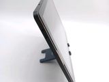 a close up picture of a cell phone on a stand