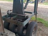 a forklift that is sitting in the dirt