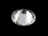 a close up of a diamond on a black background