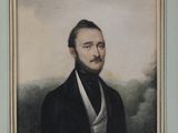 portrait of a man in a black suit and white shirt