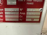 a sign on the side of a refrigerator that says couvemat route de bans