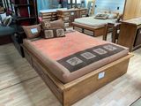 a bed that is sitting in the middle of a room