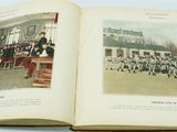 an open book with a picture of a group of people in uniform