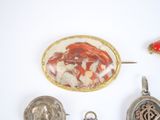 a picture of a collection of jewelry on a white surface