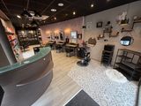 an image of a salon with a curved counter