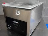 a machine that is sitting on a counter in a kitchen