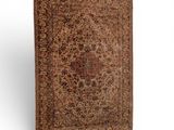 a brown and black rug on a white background