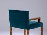 an image of a blue chair with a wooden frame on a white background