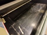 une machine dans laquelle se trouve une feuille de papier