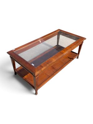 an image of a coffee table with a glass top