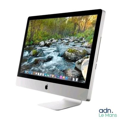 a computer monitor with a picture of a river on the screen
